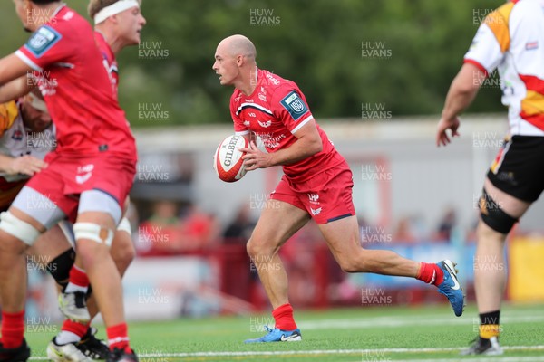 060925 - Scarlets Preseason Friendlies - Scarlets play preseason friendlies v Regional SRC Clubs Llandovery RFC and Carmarthen Quins RFC - Ioan Nicholas of Scarlets looks for support  