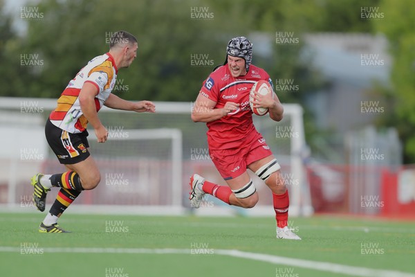 060925 - Scarlets Preseason Friendlies - Scarlets play preseason friendlies v Regional SRC Clubs Llandovery RFC and Carmarthen Quins RFC - Tristan Davies of Scarlets on the charge   
