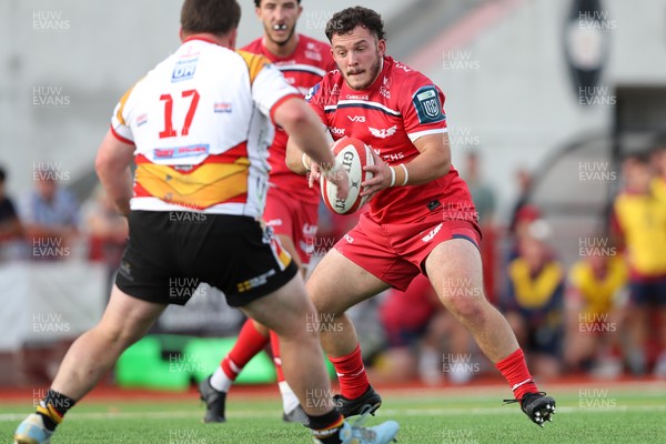 060925 - Scarlets Preseason Friendlies - Scarlets play preseason friendlies v Regional SRC Clubs Llandovery RFC and Carmarthen Quins RFC - Saul Hurley of Scarlets receives the ball 