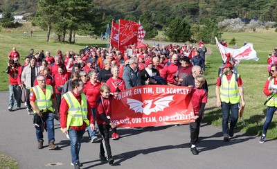 270925 - Scarlets Fans Protest - Scarlets fans march through Llanelli in protest against the Welsh Rugby Union’ s protective plan to get rid of possibly two of the Welsh rugby regions The march finished at Parc y Scarlets ahead of the Scarlets v Munster, United Rugby Championship match