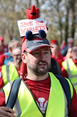 270925 - Scarlets Fans Protest - Scarlets fans march through Llanelli in protest against the Welsh Rugby Union’ s protective plan to get rid of possibly two of the Welsh rugby regions The march finished at Parc y Scarlets ahead of the Scarlets v Munster, United Rugby Championship match