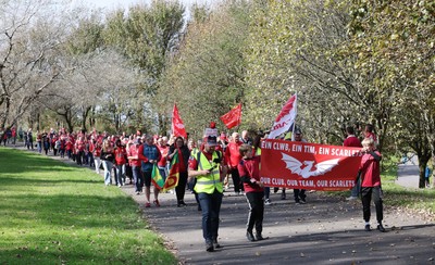 270925 - Scarlets Fans Protest - Scarlets fans march through Llanelli in protest against the Welsh Rugby Union’ s protective plan to get rid of possibly two of the Welsh rugby regions The march finished at Parc y Scarlets ahead of the Scarlets v Munster, United Rugby Championship match