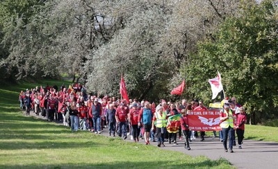 270925 - Scarlets Fans Protest - Scarlets fans march through Llanelli in protest against the Welsh Rugby Union’ s protective plan to get rid of possibly two of the Welsh rugby regions The march finished at Parc y Scarlets ahead of the Scarlets v Munster, United Rugby Championship match
