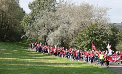 270925 - Scarlets Fans Protest - Scarlets fans march through Llanelli in protest against the Welsh Rugby Union’ s protective plan to get rid of possibly two of the Welsh rugby regions The march finished at Parc y Scarlets ahead of the Scarlets v Munster, United Rugby Championship match