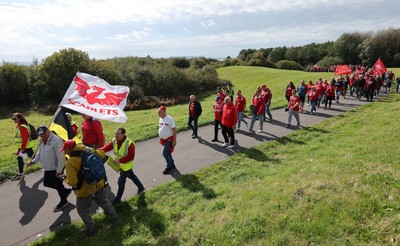 270925 - Scarlets Fans Protest - Scarlets fans march through Llanelli in protest against the Welsh Rugby Union’ s protective plan to get rid of possibly two of the Welsh rugby regions The march finished at Parc y Scarlets ahead of the Scarlets v Munster, United Rugby Championship match