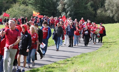 270925 - Scarlets Fans Protest - Scarlets fans march through Llanelli in protest against the Welsh Rugby Union’ s protective plan to get rid of possibly two of the Welsh rugby regions The march finished at Parc y Scarlets ahead of the Scarlets v Munster, United Rugby Championship match