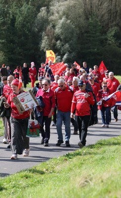270925 - Scarlets Fans Protest - Scarlets fans march through Llanelli in protest against the Welsh Rugby Union’ s protective plan to get rid of possibly two of the Welsh rugby regions The march finished at Parc y Scarlets ahead of the Scarlets v Munster, United Rugby Championship match