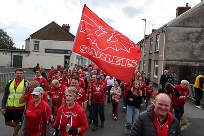 270925 - Scarlets Fans Protest - Scarlets fans march through Llanelli in protest against the Welsh Rugby Union’ s protective plan to get rid of possibly two of the Welsh rugby regions The march finished at Parc y Scarlets ahead of the Scarlets v Munster, United Rugby Championship match