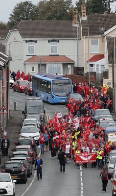 270925 - Scarlets Fans Protest - Scarlets fans march through Llanelli in protest against the Welsh Rugby Union’ s protective plan to get rid of possibly two of the Welsh rugby regions The march finished at Parc y Scarlets ahead of the Scarlets v Munster, United Rugby Championship match