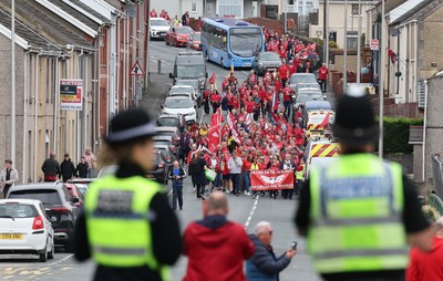 270925 - Scarlets Fans Protest - Scarlets fans march through Llanelli in protest against the Welsh Rugby Union’ s protective plan to get rid of possibly two of the Welsh rugby regions The march finished at Parc y Scarlets ahead of the Scarlets v Munster, United Rugby Championship match