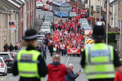 270925 - Scarlets Fans Protest - Scarlets fans march through Llanelli in protest against the Welsh Rugby Union’ s protective plan to get rid of possibly two of the Welsh rugby regions The march finished at Parc y Scarlets ahead of the Scarlets v Munster, United Rugby Championship match