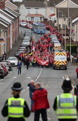 270925 - Scarlets Fans Protest - Scarlets fans march through Llanelli in protest against the Welsh Rugby Union’ s protective plan to get rid of possibly two of the Welsh rugby regions The march finished at Parc y Scarlets ahead of the Scarlets v Munster, United Rugby Championship match
