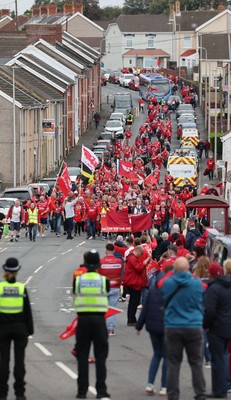 270925 - Scarlets Fans Protest - Scarlets fans march through Llanelli in protest against the Welsh Rugby Union’ s protective plan to get rid of possibly two of the Welsh rugby regions The march finished at Parc y Scarlets ahead of the Scarlets v Munster, United Rugby Championship match