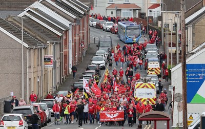 270925 - Scarlets Fans Protest - Scarlets fans march through Llanelli in protest against the Welsh Rugby Union’ s protective plan to get rid of possibly two of the Welsh rugby regions The march finished at Parc y Scarlets ahead of the Scarlets v Munster, United Rugby Championship match