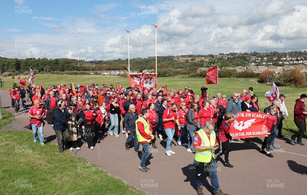 270925 - Scarlets Fans Protest - Scarlets fans march through Llanelli in protest against the Welsh Rugby Union’ s protective plan to get rid of possibly two of the Welsh rugby regions The march finished at Parc y Scarlets ahead of the Scarlets v Munster, United Rugby Championship match