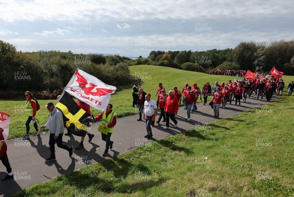 270925 - Scarlets Fans Protest - Scarlets fans march through Llanelli in protest against the Welsh Rugby Union’ s protective plan to get rid of possibly two of the Welsh rugby regions The march finished at Parc y Scarlets ahead of the Scarlets v Munster, United Rugby Championship match