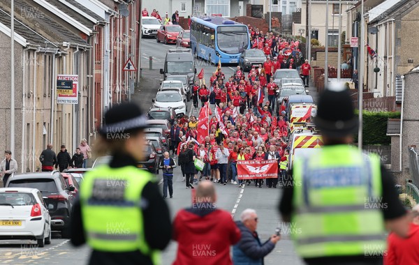 270925 - Scarlets Fans Protest - Scarlets fans march through Llanelli in protest against the Welsh Rugby Union’ s protective plan to get rid of possibly two of the Welsh rugby regions The march finished at Parc y Scarlets ahead of the Scarlets v Munster, United Rugby Championship match