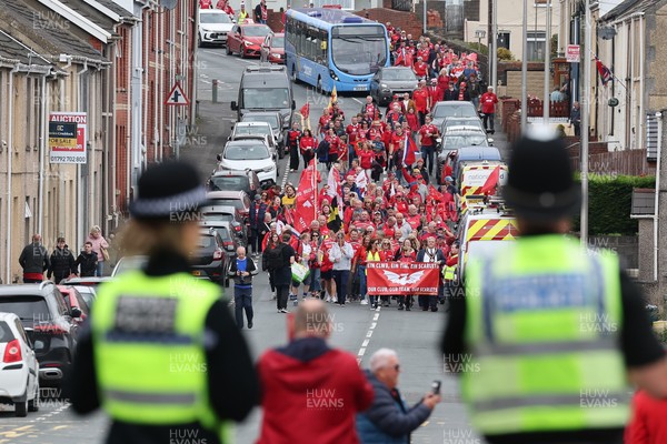 270925 - Scarlets Fans Protest - Scarlets fans march through Llanelli in protest against the Welsh Rugby Union’ s protective plan to get rid of possibly two of the Welsh rugby regions The march finished at Parc y Scarlets ahead of the Scarlets v Munster, United Rugby Championship match