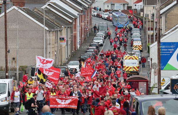 270925 - Scarlets Fans Protest - Scarlets fans march through Llanelli in protest against the Welsh Rugby Union’ s protective plan to get rid of possibly two of the Welsh rugby regions The march finished at Parc y Scarlets ahead of the Scarlets v Munster, United Rugby Championship match