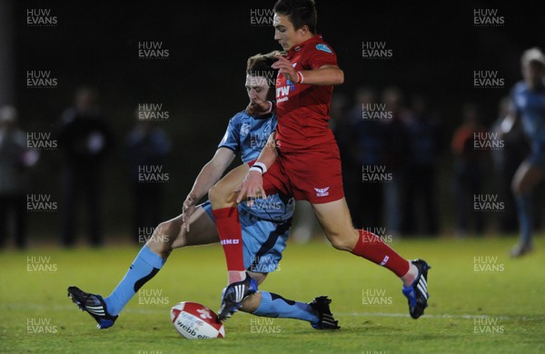 30.09.09 - Scarlets U16s v Blues North U16s - WRU Under 16 Regional Championship - Scarlets Jordan Williams chips ahead to score try. 