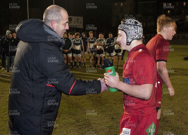 200213 - Scarlets v Cardiff Blues South - Age Grade Final -  Victorious Scarlets players collect their winners medals from Joe Lydon  