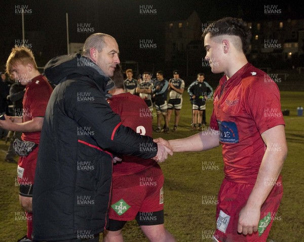 200213 - Scarlets v Cardiff Blues South - Age Grade Final -  Victorious Scarlets players collect their winners medals from Joe Lydon  