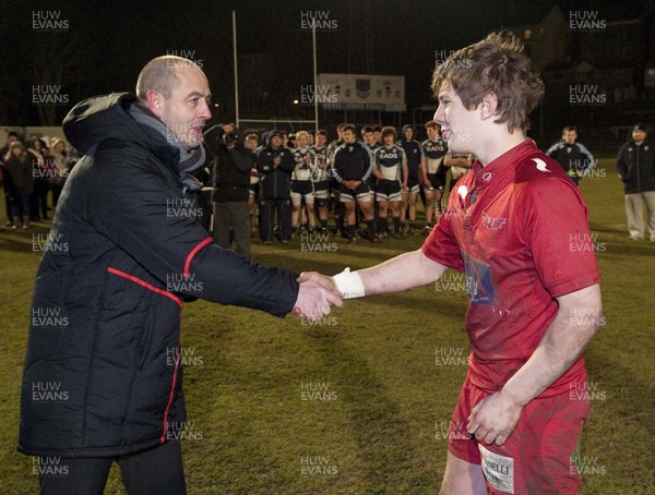 200213 - Scarlets v Cardiff Blues South - Age Grade Final -  Victorious Scarlets players collect their winners medals from Joe Lydon  