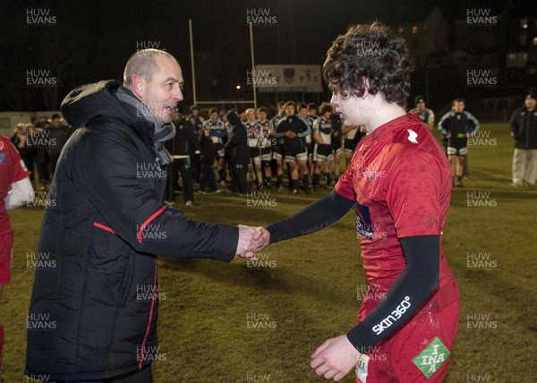 200213 - Scarlets v Cardiff Blues South - Age Grade Final -  Victorious Scarlets players collect their winners medals from Joe Lydon  