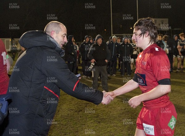 200213 - Scarlets v Cardiff Blues South - Age Grade Final -  Victorious Scarlets players collect their winners medals from Joe Lydon  