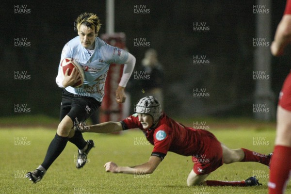 28.10.09 Scarlets Under 16's v Ospreys Under 16's - Regional Age Grade Championship - Ospreys' winger Rhys Williams makes a break. 