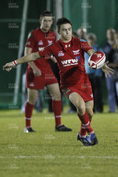 28.10.09 Scarlets Under 16's v Ospreys Under 16's - Regional Age Grade Championship - Scarlets' outside half Jordan Williams clears the ball to touch.  