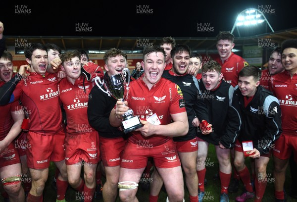 060218 - Scarlets Under 18s v Blues North Under 18s - Gethin Davies of Scarlets lifts the trophy