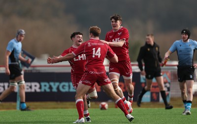 160225  Scarlets U18s v Cardiff U18s, WRU Regional Age Grade Semi Final - Thomas Williams of Scarlets celebrates with Cellan Allcock of Scarlets and Sion Jones of Scarlets after he races in to score try