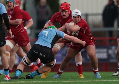 160225  Scarlets U18s v Cardiff U18s, WRU Regional Age Grade Semi Final - Jake Bowen of Scarlets takes on Theo Williams of Cardiff Rugby