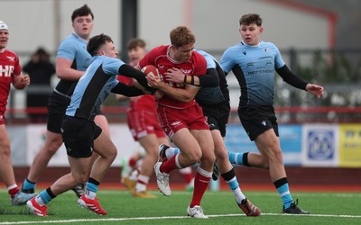 160225  Scarlets U18s v Cardiff U18s, WRU Regional Age Grade Semi Final - Thomas Williams of Scarlets is tackled short of the line