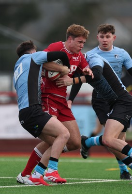 160225  Scarlets U18s v Cardiff U18s, WRU Regional Age Grade Semi Final - Thomas Williams of Scarlets is tackled short of the line