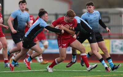 160225  Scarlets U18s v Cardiff U18s, WRU Regional Age Grade Semi Final - Thomas Williams of Scarlets is tackled short of the line