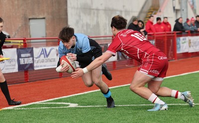 160225  Scarlets U18s v Cardiff U18s, WRU Regional Age Grade Semi Final - Joe Fernandez of Cardiff Rugby is forced into touch by a try saving tackle from Carwyn Jones of Scarlets