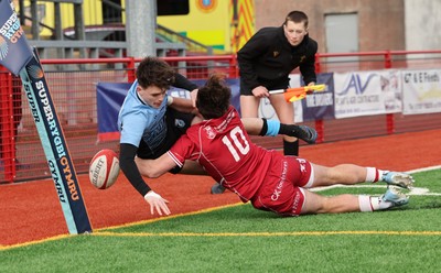 160225  Scarlets U18s v Cardiff U18s, WRU Regional Age Grade Semi Final - Joe Fernandez of Cardiff Rugby is forced into touch by a try saving tackle from Carwyn Jones of Scarlets