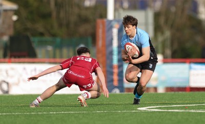 160225  Scarlets U18s v Cardiff U18s, WRU Regional Age Grade Semi Final - Ioan Penry of Cardiff Rugby takes on Harri Davies of Scarlets