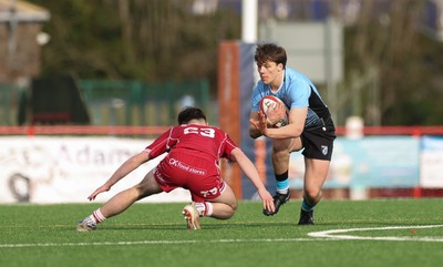 160225  Scarlets U18s v Cardiff U18s, WRU Regional Age Grade Semi Final - Ioan Penry of Cardiff Rugby takes on Harri Davies of Scarlets