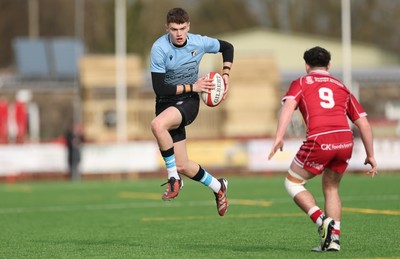 160225  Scarlets U18s v Cardiff U18s, WRU Regional Age Grade Semi Final - Will Adams of Cardiff Rugby takes on Cellan Allcock of Scarlets