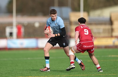 160225  Scarlets U18s v Cardiff U18s, WRU Regional Age Grade Semi Final - Will Adams of Cardiff Rugby takes on Cellan Allcock of Scarlets