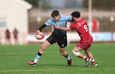 160225  Scarlets U18s v Cardiff U18s, WRU Regional Age Grade Semi Final - Will Adams of Cardiff Rugby takes on Cellan Allcock of Scarlets