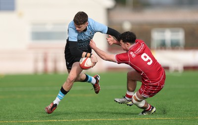 160225  Scarlets U18s v Cardiff U18s, WRU Regional Age Grade Semi Final - Will Adams of Cardiff Rugby takes on Cellan Allcock of Scarlets