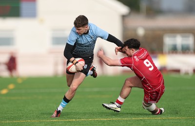 160225  Scarlets U18s v Cardiff U18s, WRU Regional Age Grade Semi Final - Will Adams of Cardiff Rugby takes on Cellan Allcock of Scarlets