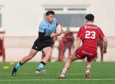 160225  Scarlets U18s v Cardiff U18s, WRU Regional Age Grade Semi Final - Mason Daniels of Cardiff Rugby takes on Harri Davies of Scarlets