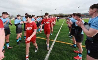 160225  Scarlets U18s v Cardiff U18s, WRU Regional Age Grade Semi Final - Scarlets players are applauded off the pitch at the end of the match