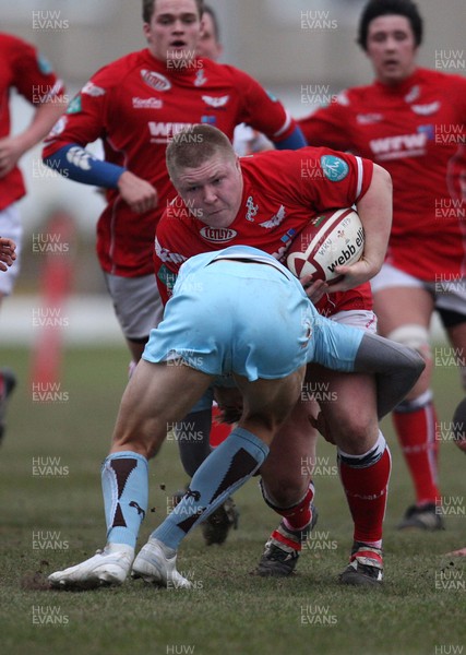 11.01.09 - Scarlets U18 v Ospreys U18, WRU Under 18 Regional Championship Final, Swansea. -  Scarlets' Gareth Havard is tackled by Ospreys' Tom Prydie   