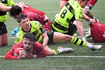 230225 - Scarlets U18s v Dragons U18s - Regional Age-Grade Championship finals - Bowyn Clark of Scarlets U18s scores a try